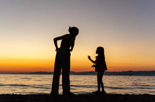 Silhouette of mother and child